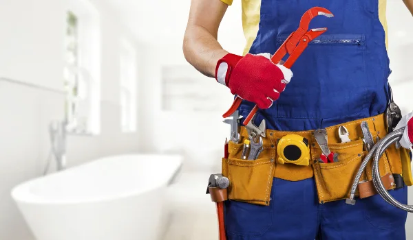 the torso of a plumbing technician showing a tool belt from Emergency Plumber Grand Prairie in Grand Prairie, TX - Slab Leak Detection